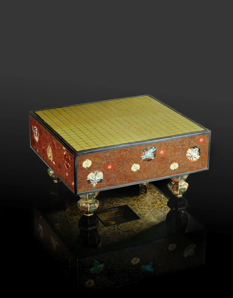 An extremely rare and fine cloisonné enamel model of a traditional go-ban (games board), Honda Kozaburo of Nagoya (Bonhams lot 255, view 1)
