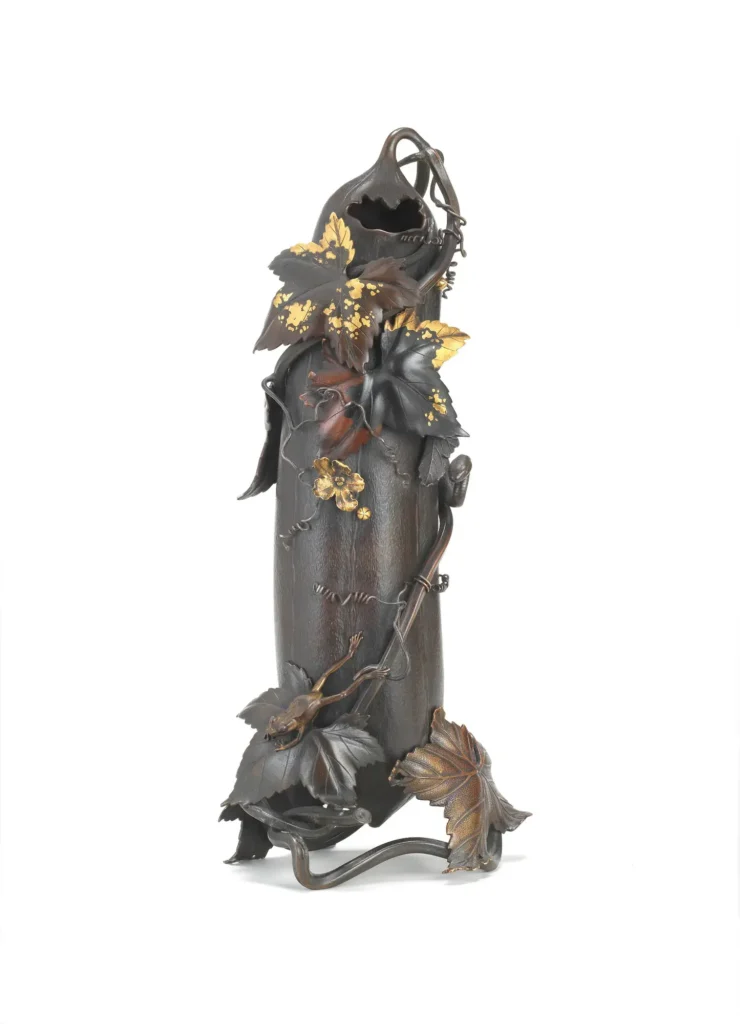 An exquisitely cast and inlaid bronze hanaike (flower vase) in the form of a gourd, Shōami Katsuyoshi (Bonhams lot 190, view 1)