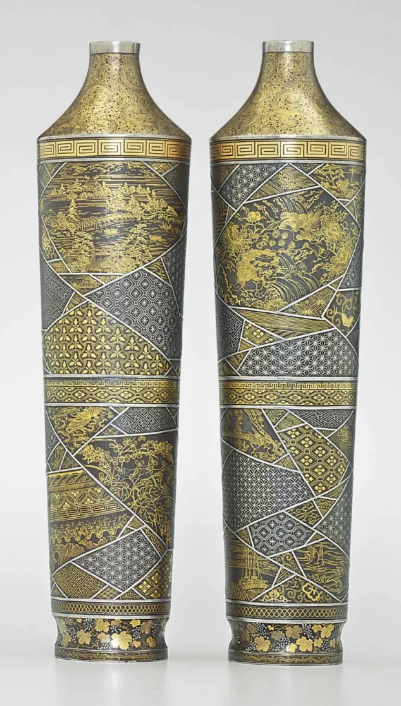 A pair of inlaid iron vases, Komai Company (Kyoto) (Christie's lot 114, view 1)